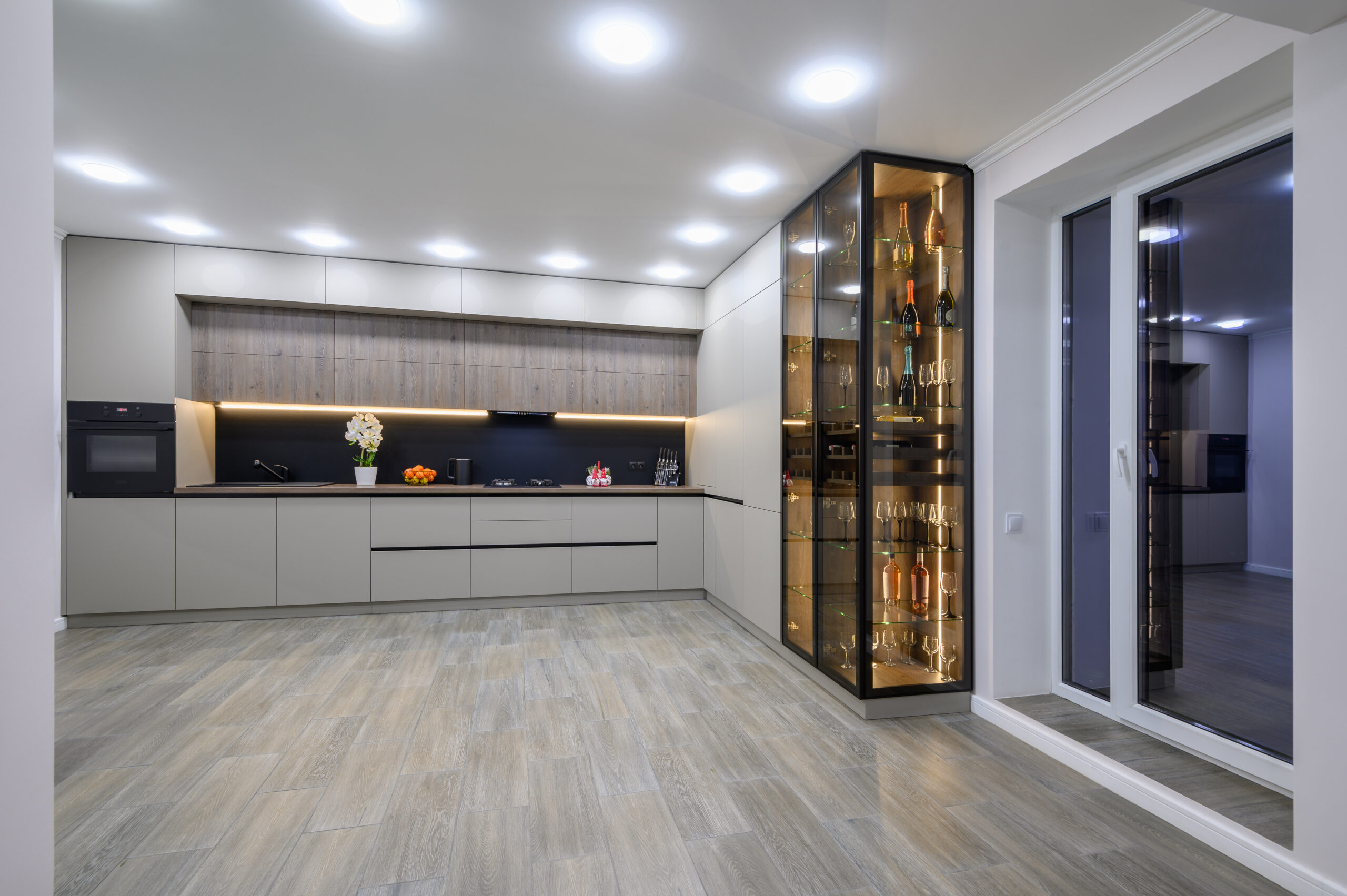 Trendy grey modern kitchen interior showcase with minimalistic furniture