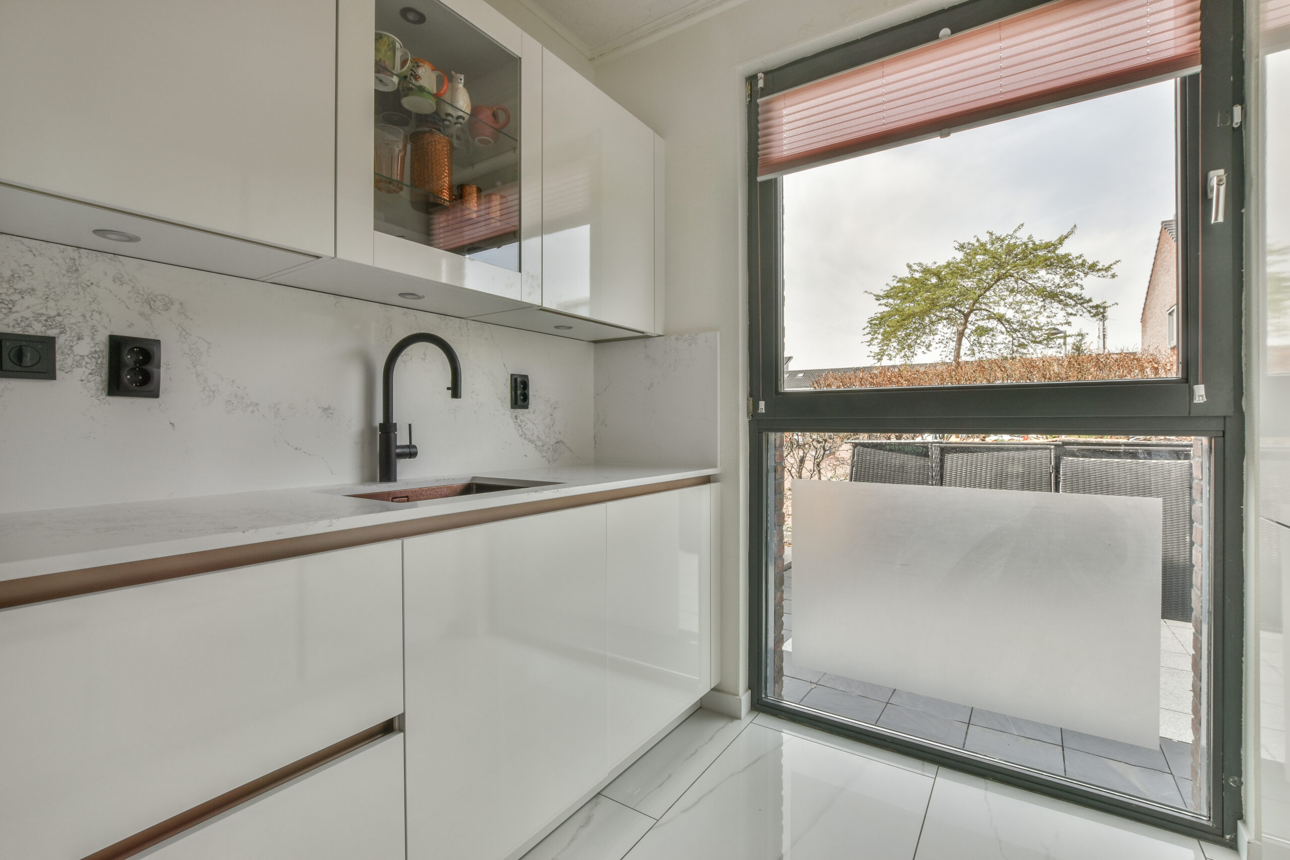 Spacious bright kitchen with dining area, modern design and panoramic windows