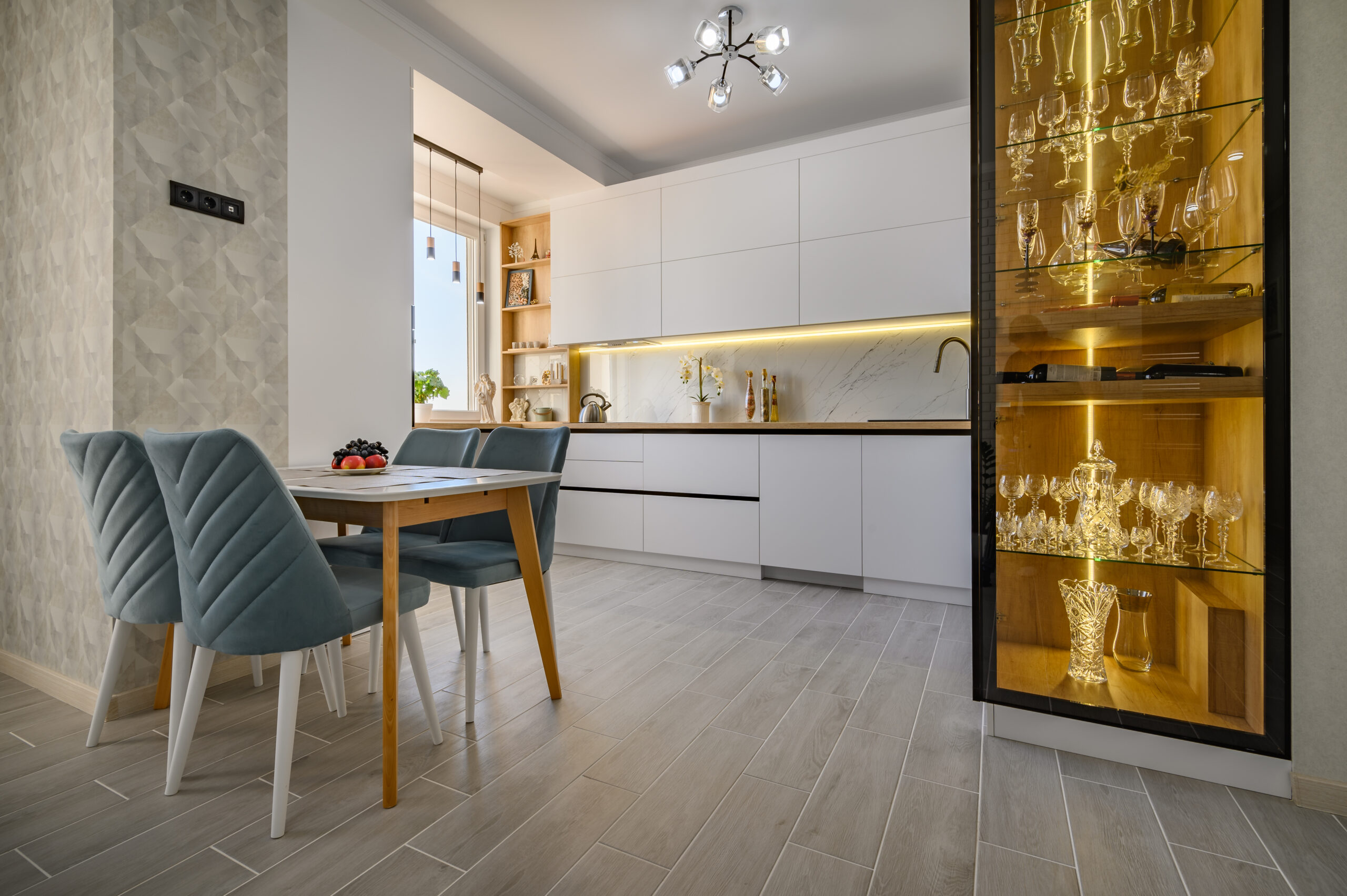 Modern and stylish white studio apartment with fully functional kitchen