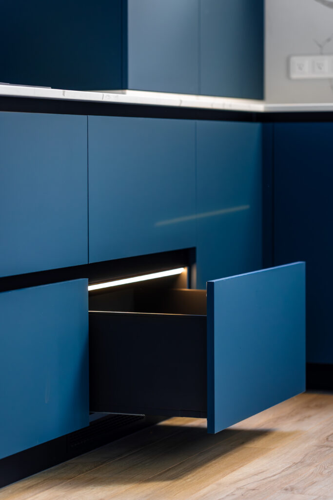 Portrait view of a single extended deep drawer with a linear LED channel, warm glow meets cool blue for a refined, premium look.